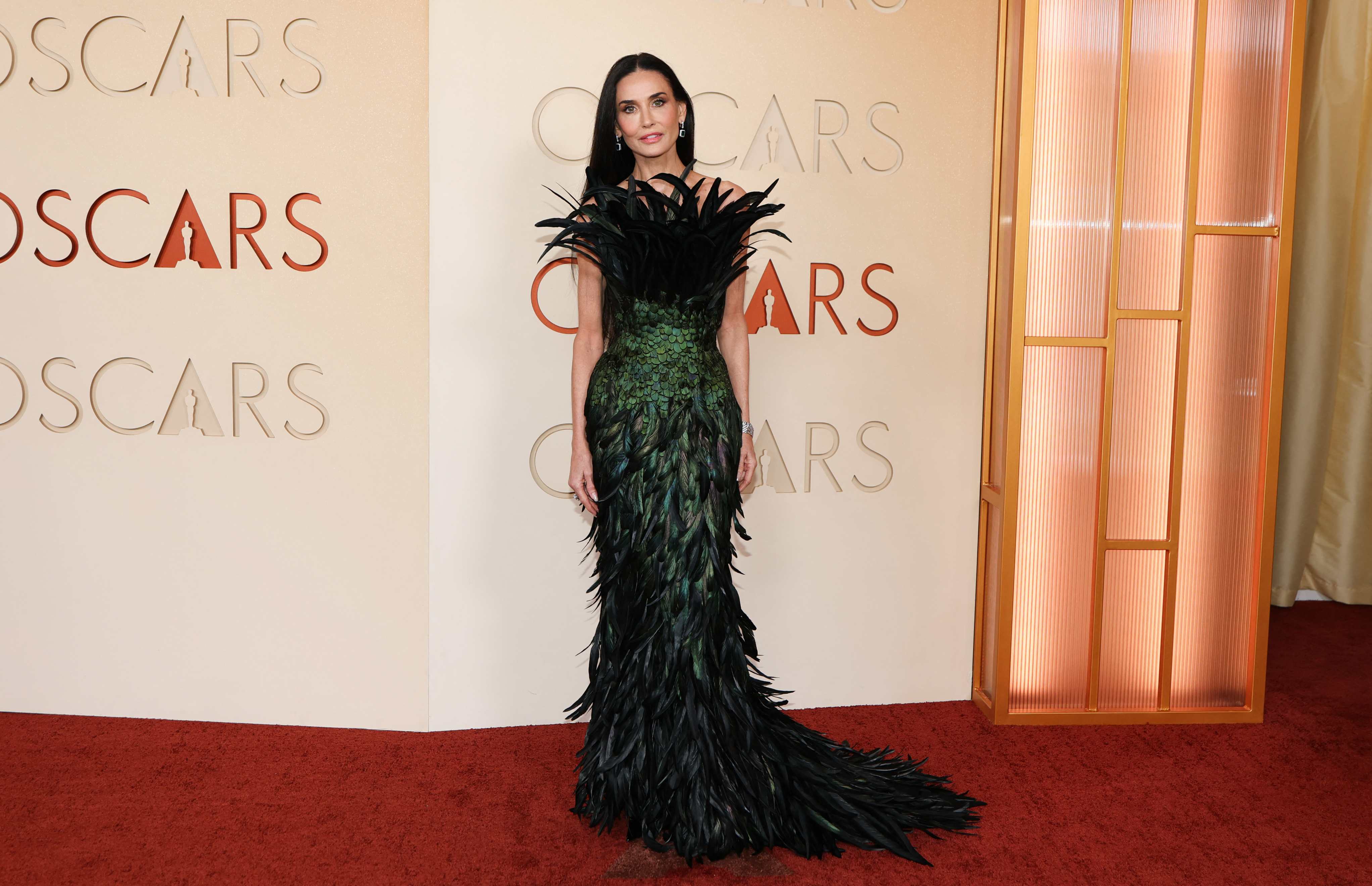 Demi Moore chose a custom gown by Gucci. Photo: AFP Demi Moore chose a custom gown by Gucci. Photo: AFP