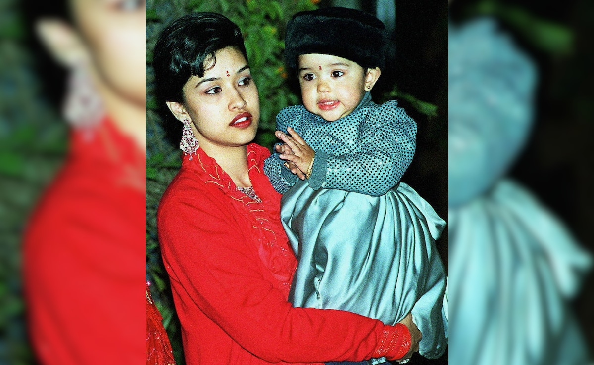 Late Nepalese Princess Shruti holding her two-year-old daughter Girbani 