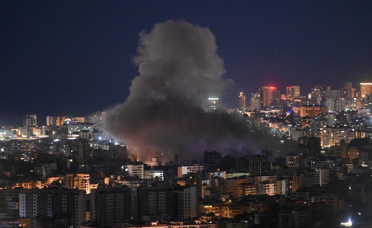 Smoke rises from the site of an Israeli airstrike that targeted an area in Beiruts southern neighborhood