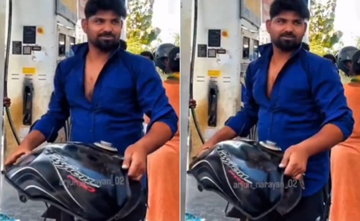 बोतल में पेट्रोल नहीं मिला तो किया अजीब जुगाड़, बाइक की टंकी ही निकालकर उठा लाया शख्स, वायरल हो रहा Video