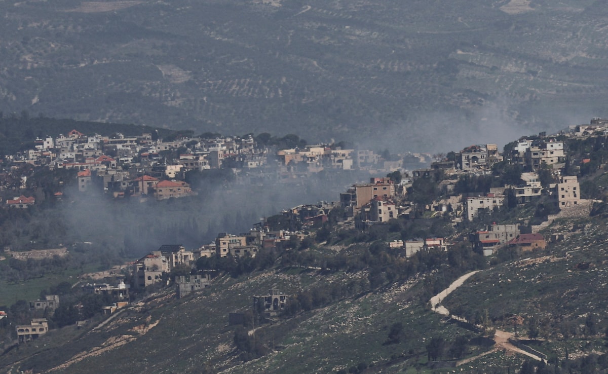Smoke rises from a Lebanese village near the border with Israel on March 19, 2026