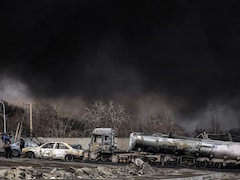 First Inferno, Then Darkness: Smoke From Burning Oil Blots Out Sun In Tehran