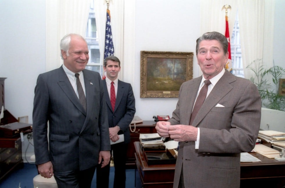 President Reagan in Robert McFarlane's office with Adolfo Calero (Nicaraguan Democratic Resistance (Contra) leader) and Oliver North, Apr 4, 1985