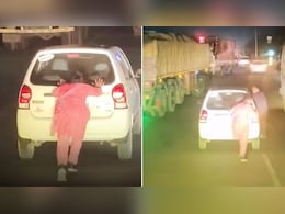 बीच हाईवे पर खराब हुई कार, पति की मदद के लिए पत्नी ने लगाया धक्का, दिल छू लेने वाला वीडियो इंटरनेट पर हुआ वायरल