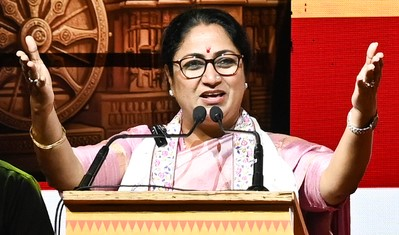 Delhi CM Rekha Gupta announcing her plans for the merger