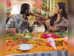 Rashmika Mandanna Feeds Husband Vijay Deverakonda At Virosh Fan Meet In Hyderabad. Watch