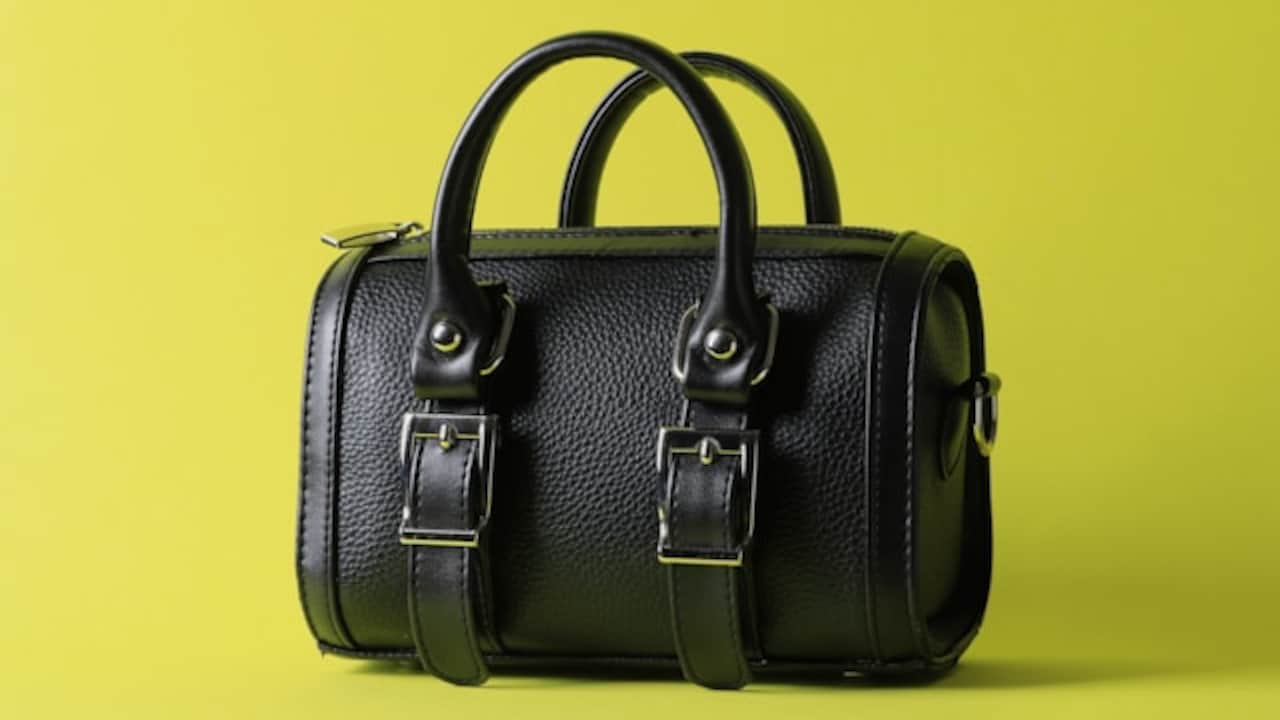 What is the impact of carrying heavy bags on our bodies