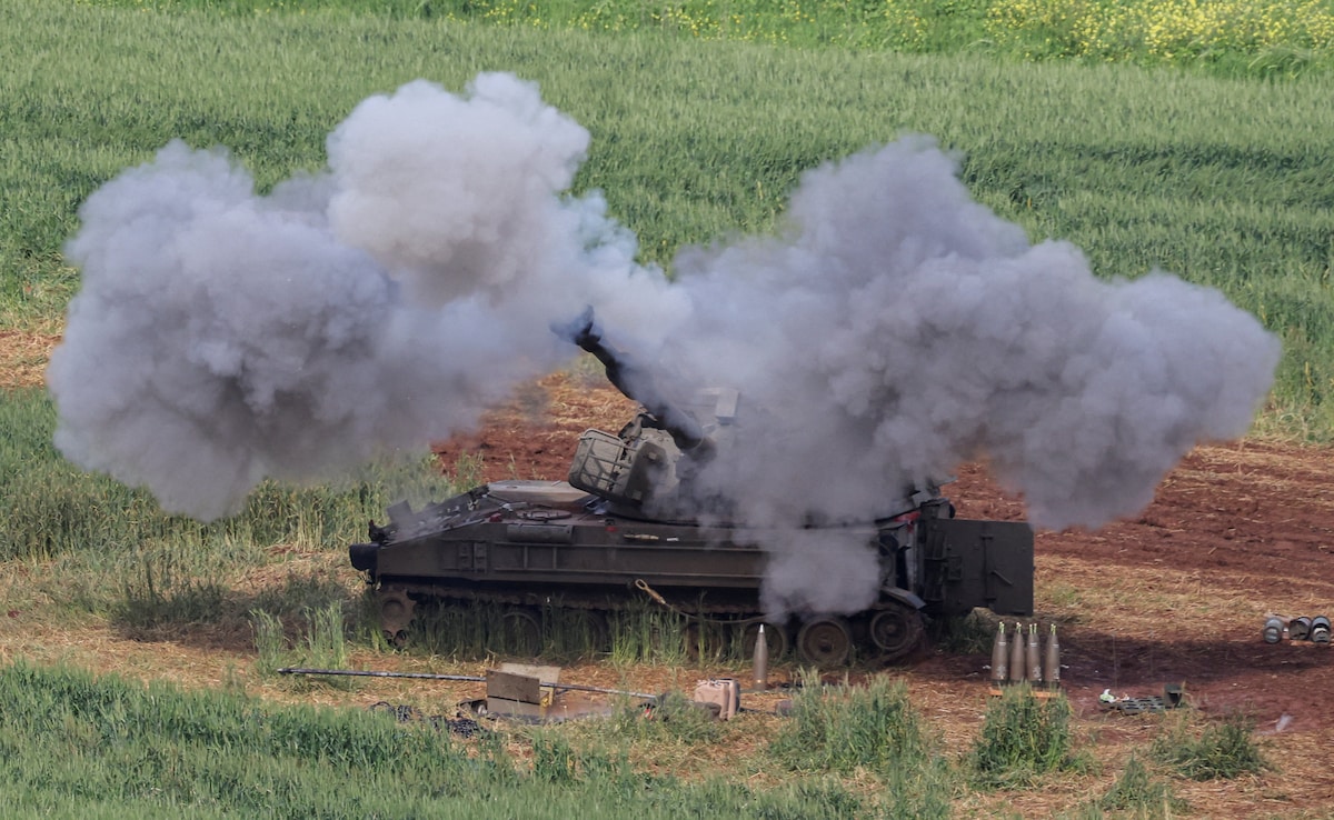 An Israeli artillery unit fires towards Lebanon An Israeli artillery unit fires towards Lebanon