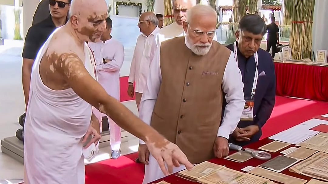 Prime Minister Narendra Modi views ancient manuscripts 