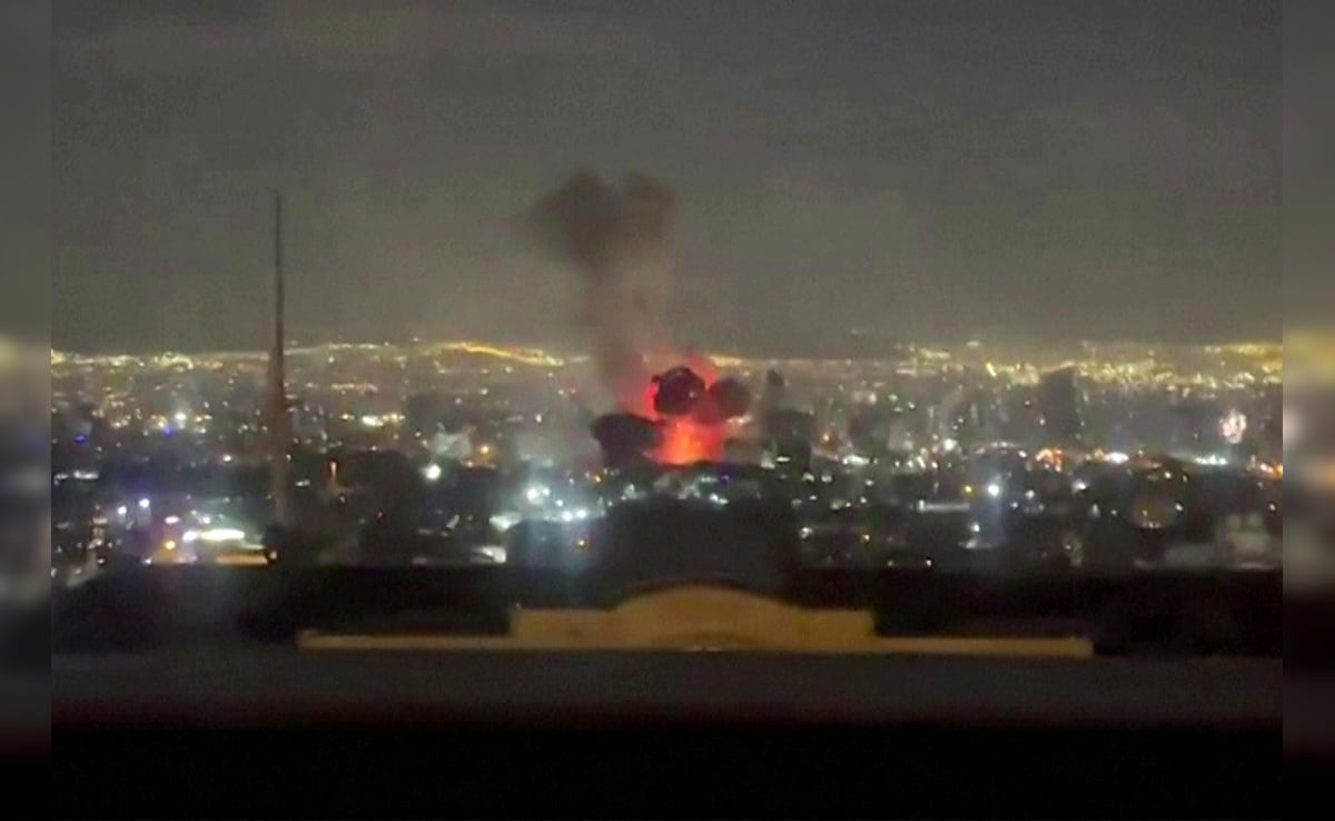 Explosion following a strike in Tehran. (AFP)