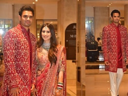 Arjun Tendulkar And Saaniya Chandhok Keep It Classic In Coordinated Red Wedding Ensembles