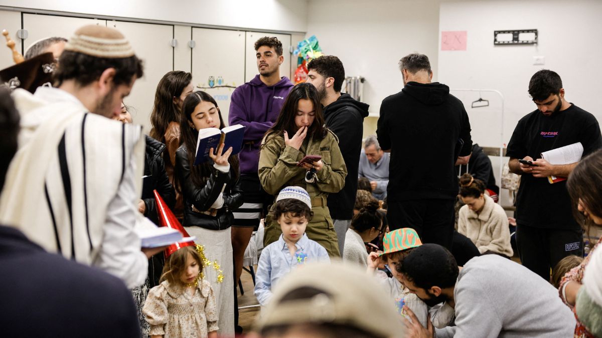 Tel Aviv residents take refuge in a bomb shelter.