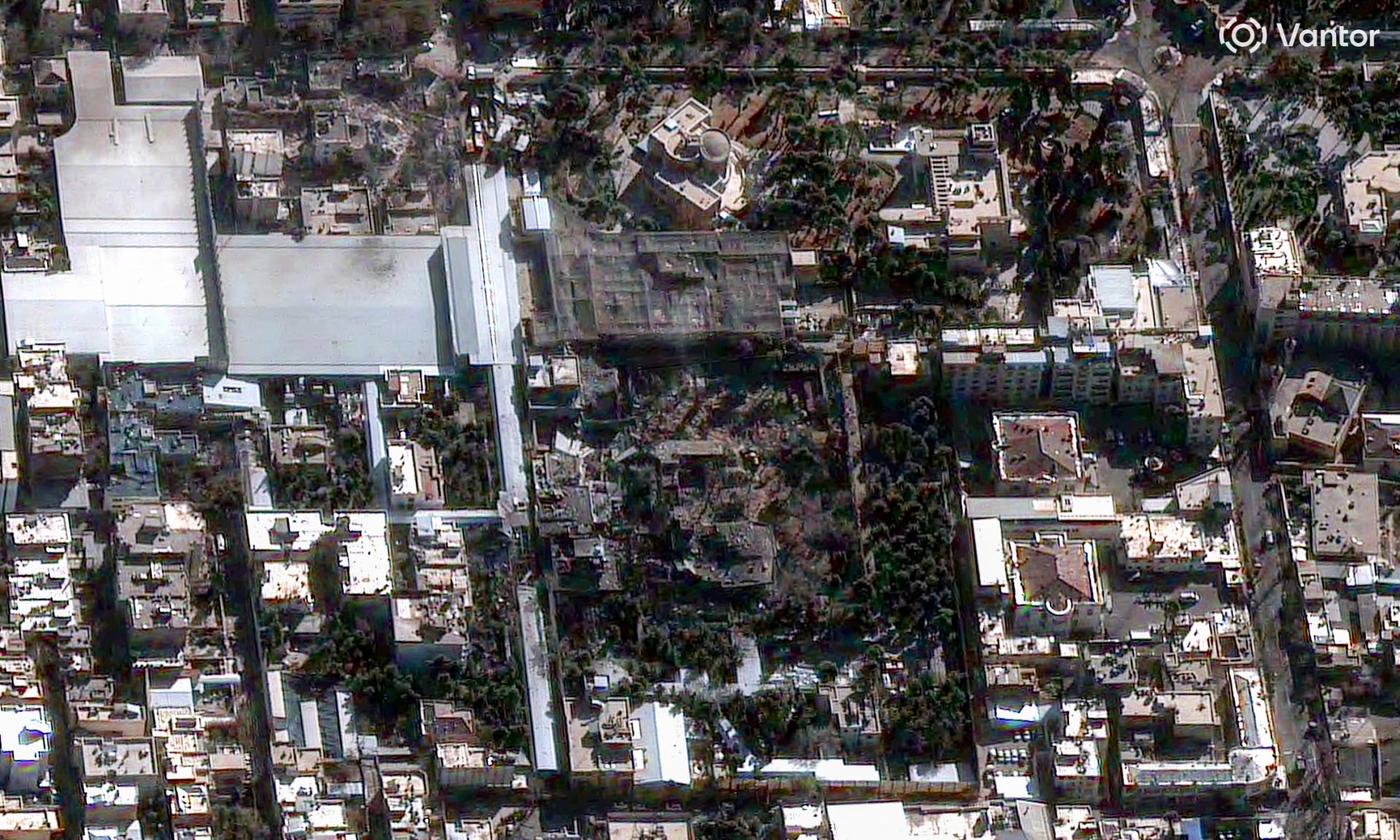 Satellite imagery shows the impat of the missile on the compound. 