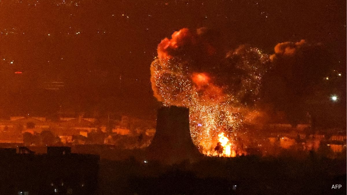 An explosion erupts following strikes near Mehrabad Airport in Tehran