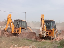 ग्रेटर नोएडा में बड़ा ऐक्शन, 15 हजार वर्ग मीटर जमीन पर चला योगी का बुलडोजर, करोड़ों में है कीमत