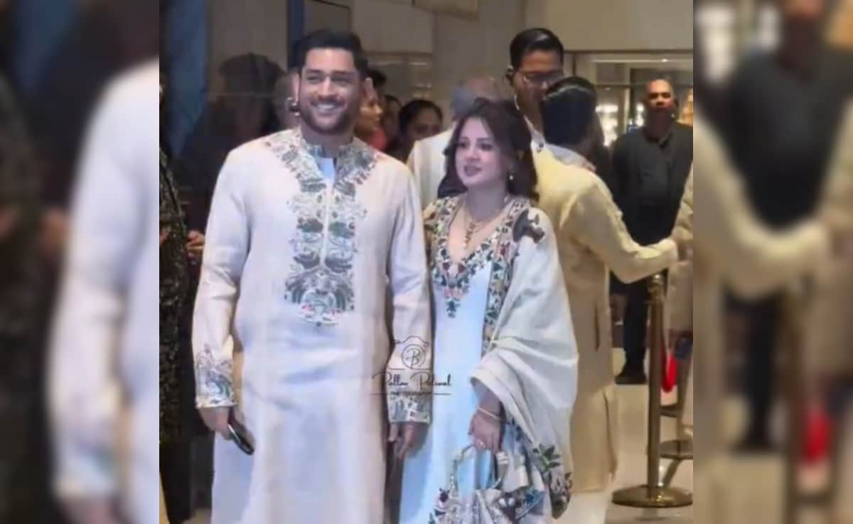 His Or Sakshis? Internet Curious As MS Dhoni Spotted With Phone At Arjun Tendulkars Wedding