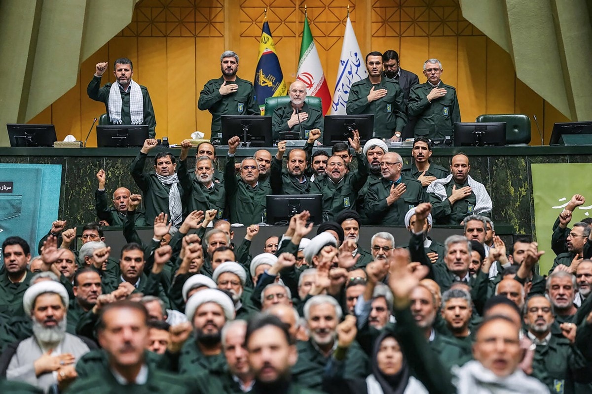 Members of Irans parliament dressed in IRGC uniforms, chant "Death to America" during a session in Tehran on February 1, 2026
