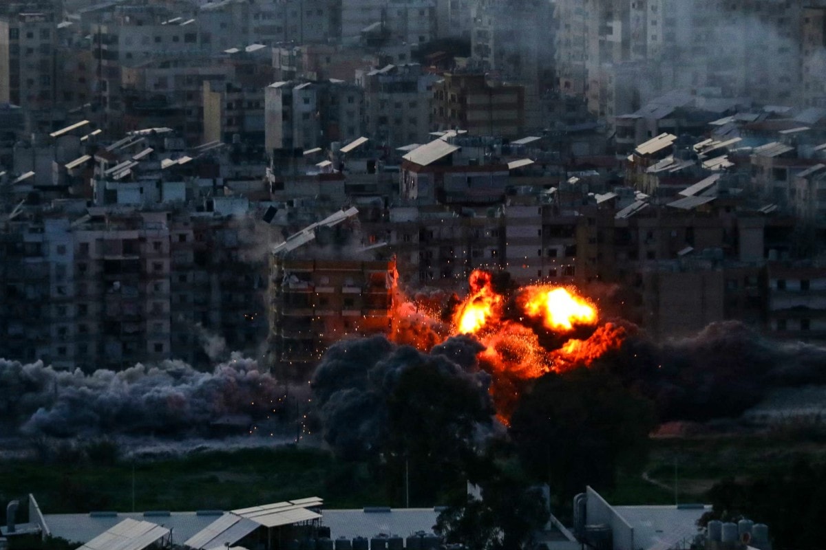 A fireball ascends from the site of an Israeli airstrike that targeted an area in Beirut's southern suburbs on March 6, 2026.