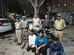 4 Men In Hyderabad Perform Stunts On Scooter For Reels In Front Of Cop Car