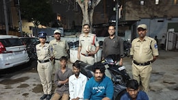 4 Men In Hyderabad Perform Stunts On Scooter For Reels In Front Of Cop Car