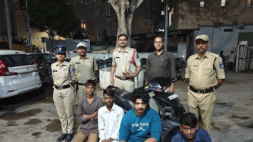 4 Men In Hyderabad Perform Stunts On Scooter For Reels In Front Of Cop Car