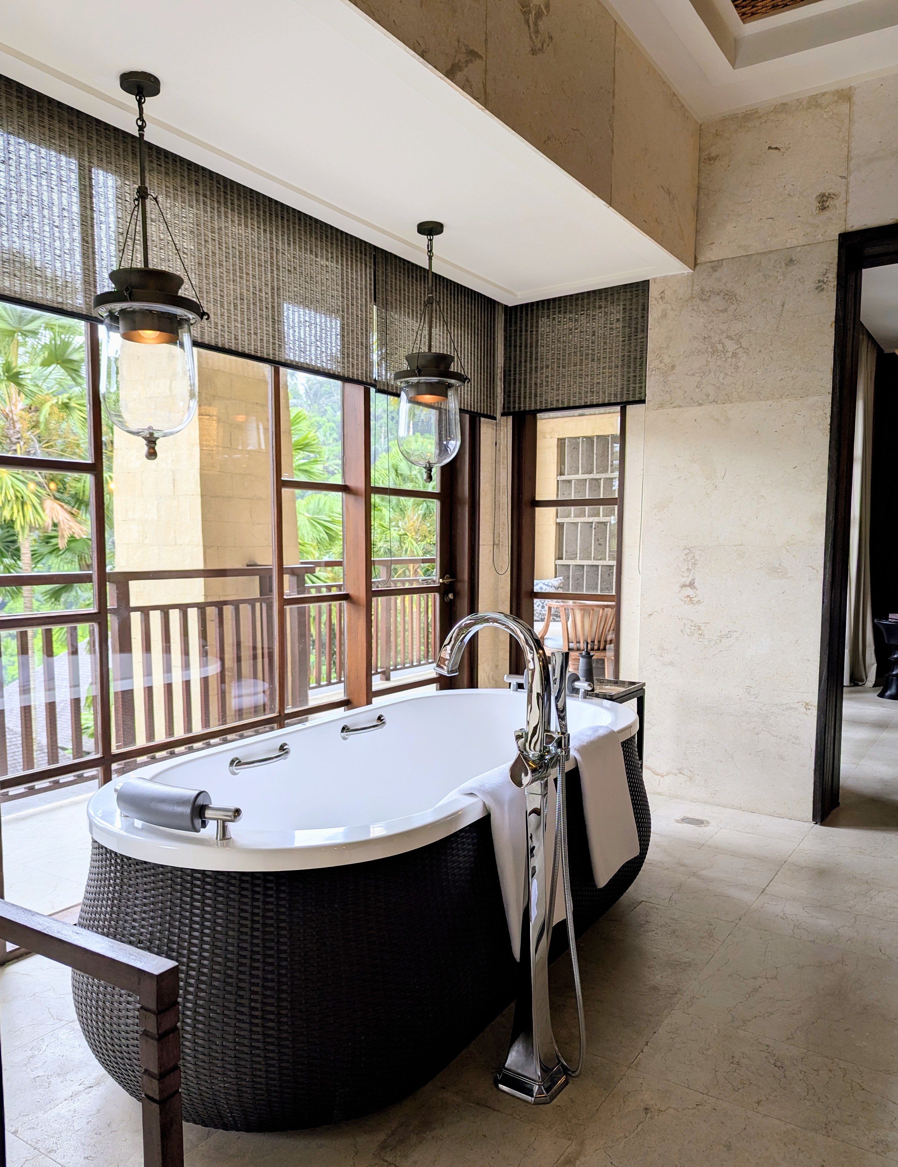 The rattan-wrapped bathtub in the Mandapa Suite. Photo: Author