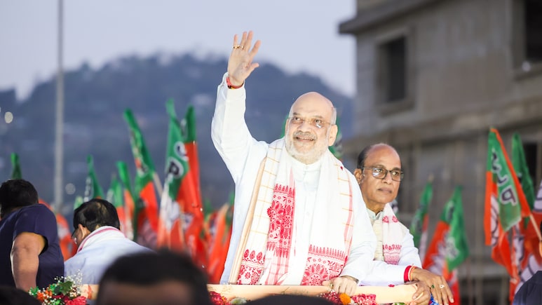 90 से ज्यादा सीटों के साथ असम में फिर बीजेपी सरकार, अमित शाह ने गुवाहाटी रोड शो में जताया भरोसा