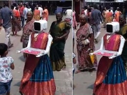 साड़ी पहनकर वोटर्स का स्वागत कर रहा रोबोट! तमिलनाडु चुनाव में दिखा अनोखा नजारा - देखें Video