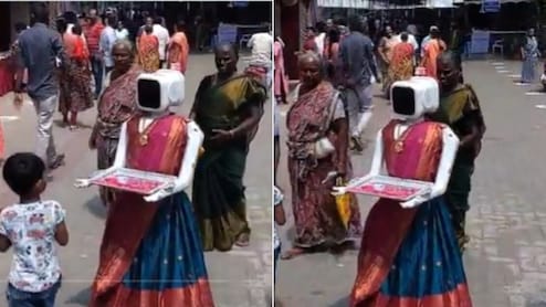 साड़ी पहनकर वोटर्स का स्वागत कर रहा रोबोट! तमिलनाडु चुनाव में दिखा अनोखा नजारा - देखें Video