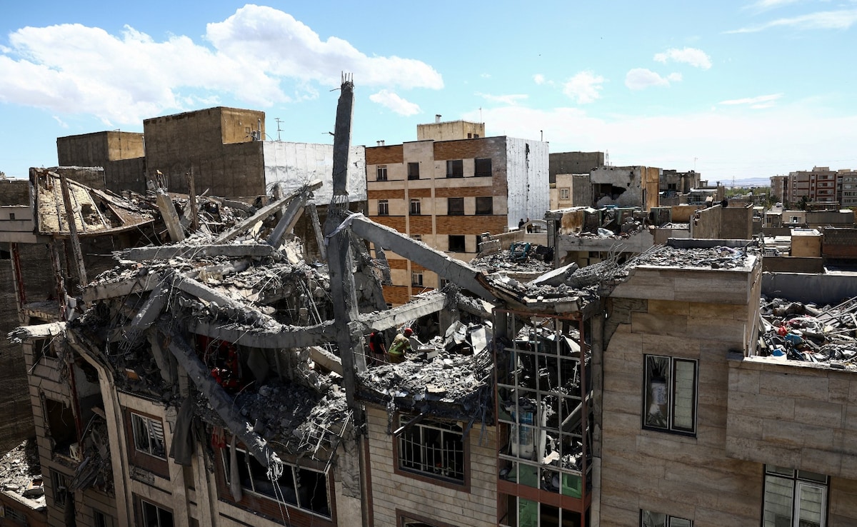A view of a residential building damaged by a strike in Tehran, Iran