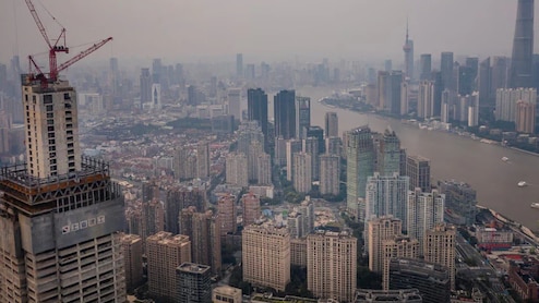 Too Expensive To Die? China's Burial Crisis Forces Families Into Flats