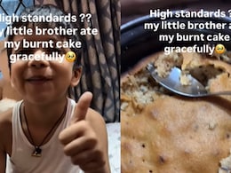 This Little Boy's Reaction To His Sister's Burnt Cake Is Melting Hearts Online