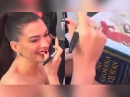Fan Gifts Anne Hathaway Quran At <i>Devil Wears Prada 2</i> London Event After "Inshallah" Remark, Her Reaction Goes Viral