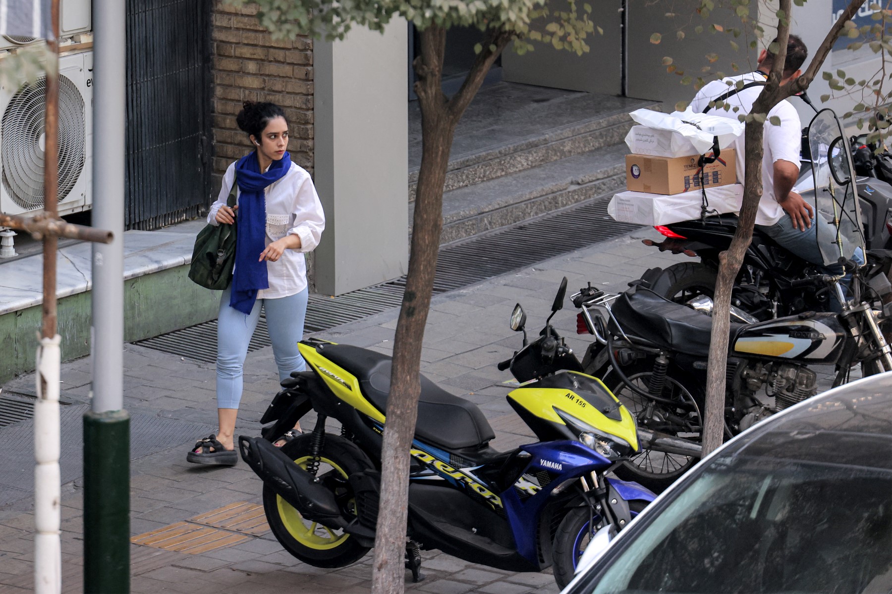 A woman without a hijab in Tehran.