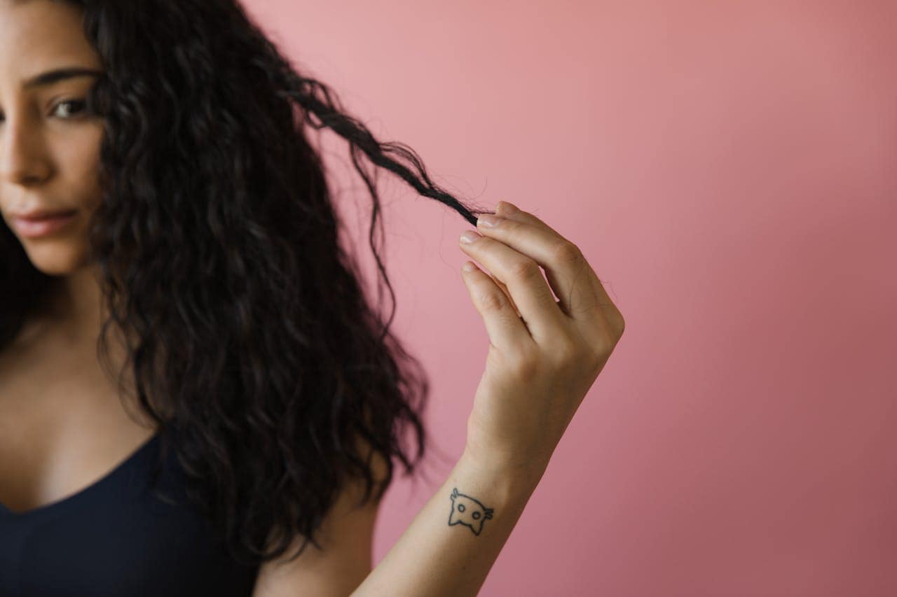 Tame you frizzy and curly hair