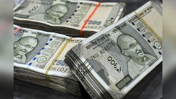 Rupee Seen Sliding To 100 Per Dollar As Oil Prices Surge