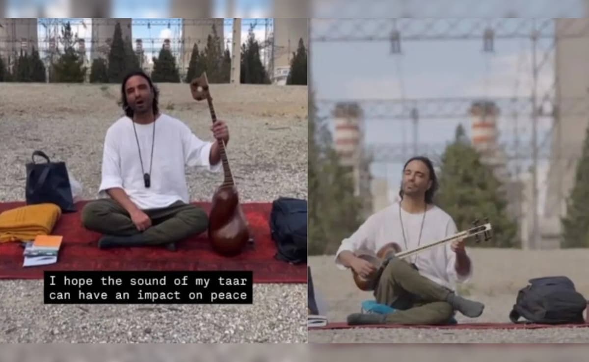 बारूद पर भारी पड़ा 'तार', ईरान के इस कलाकार ने पावर प्लांट के बाहर छेड़ा शांति का राग