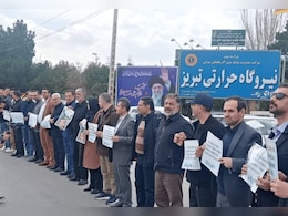 ईरान में हमले शुरू होते ही पावर प्लांट पर मानव चेन बना कर खड़े हो गए लोग, देखें तस्वीरें-वीडियो