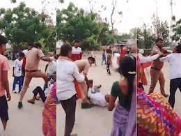 Viral Video: यूपी पुलिस के जवान ने सरेराह ई-रिक्शा चालक पर बरसाए लात-घूसे, वीडियो वायरल होने पर आरोपी निलंबित