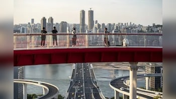 China's Economy Revs Up Despite War as Growth Tops Forecasts