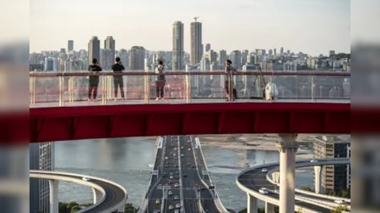 China's Economy Revs Up Despite War as Growth Tops Forecasts