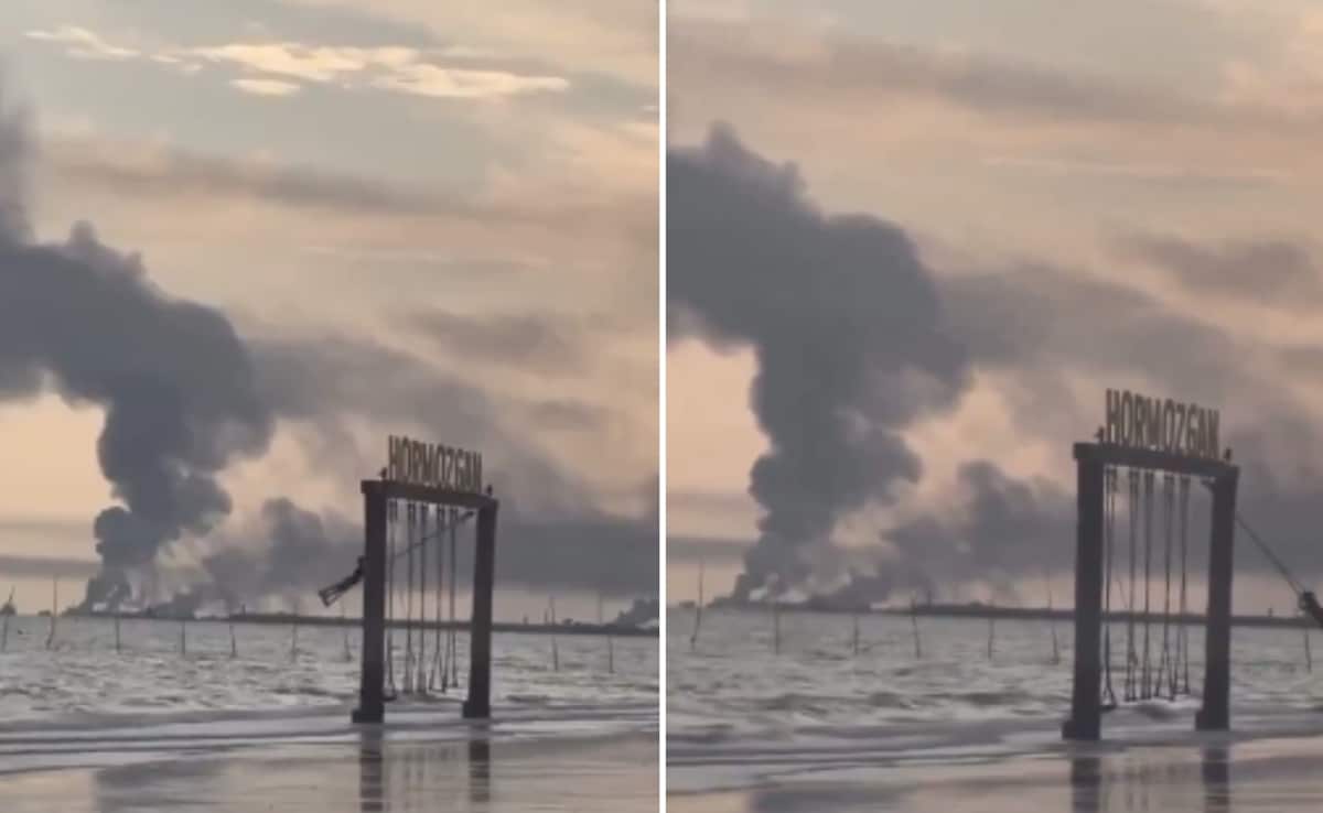 Video: Iranian Girl Swings As Smoke Rises In Background After US-Israel Strike