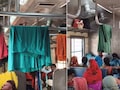 चलती ट्रेन के अंदर 'धोबी घाट'! पैसेंजर्स के सिर के ऊपर रेलिंग पर लटकते दिखे पेटीकोट