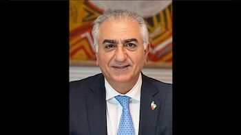 Protester Splashes 'Red Fluid' On Iran's Exiled Prince Reza Pahlavi Over Pro-War Rhetoric | Watch Video