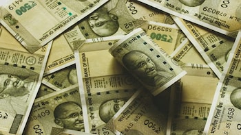 Rupee Gains 14 Paise, Settles At 93.04 Against US Dollar