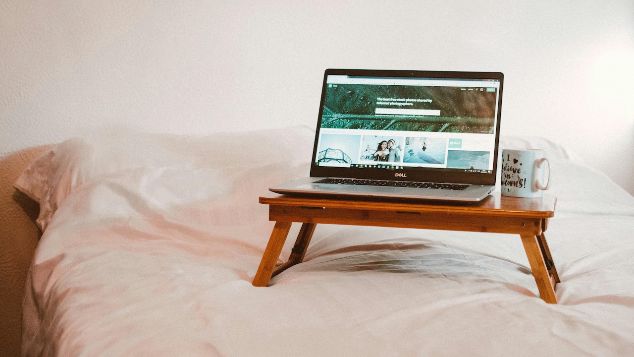 Laptop table vs desk which is better for productivity Laptop table vs desk which is better for productivity