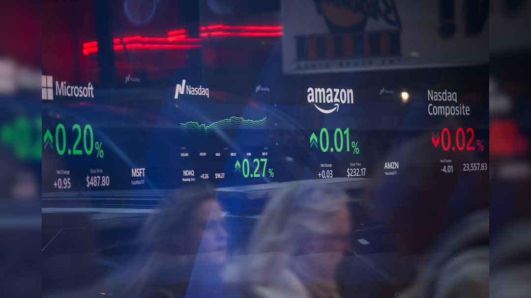 Wall Street Highlights: Nasdaq Gains, S&P 500 Flat As Fed Holds Rates, Oil Spikes