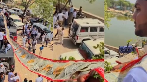 Rajasthan: दूल्हे ने पहनी 100 फुट लंबी 500 रु के नोटों की माला, संभालने के लिए छत पर चढ़ना पड़ा, देखें वीडियो