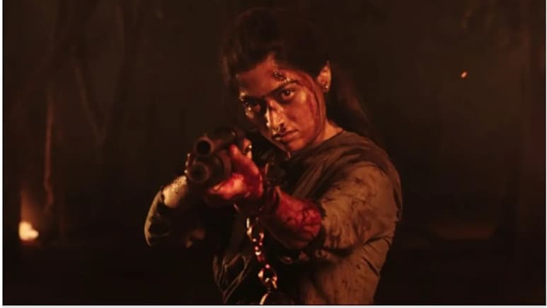 रश्मिका मंदाना मना रहीं 30वां बर्थडे, फैंस को दिया तोहफा, अपकमिंग फिल्म में हाथ में बंदूक, हथकड़ी में दिखीं पुष्पा की 'श्रीवल्ली'