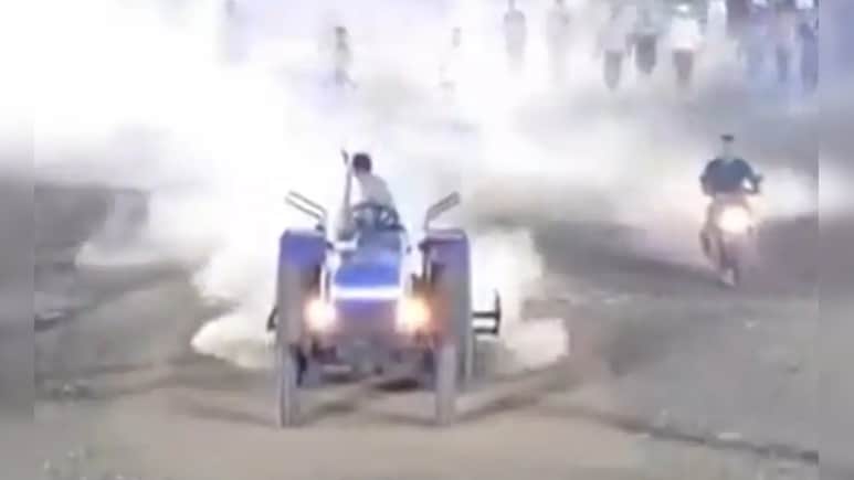 VIDEO: मैच के लिए नहीं मिला निमंत्रण तो भड़क गया नेता, ट्रैक्टर से खोद डाली पूरी पिच